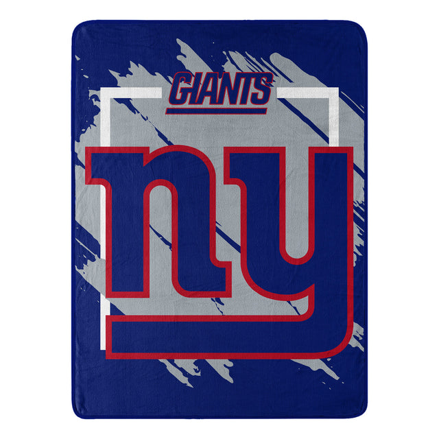 Manta de los New York Giants de 46 x 60, diseño dimensional Micro Raschel, enrollada