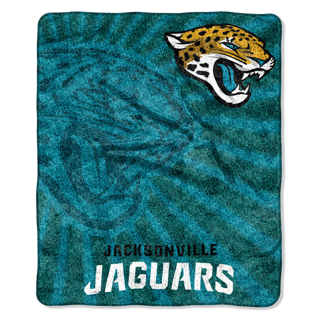 Manta de los Jacksonville Jaguars de 50 x 60 con diseño estroboscópico de sherpa