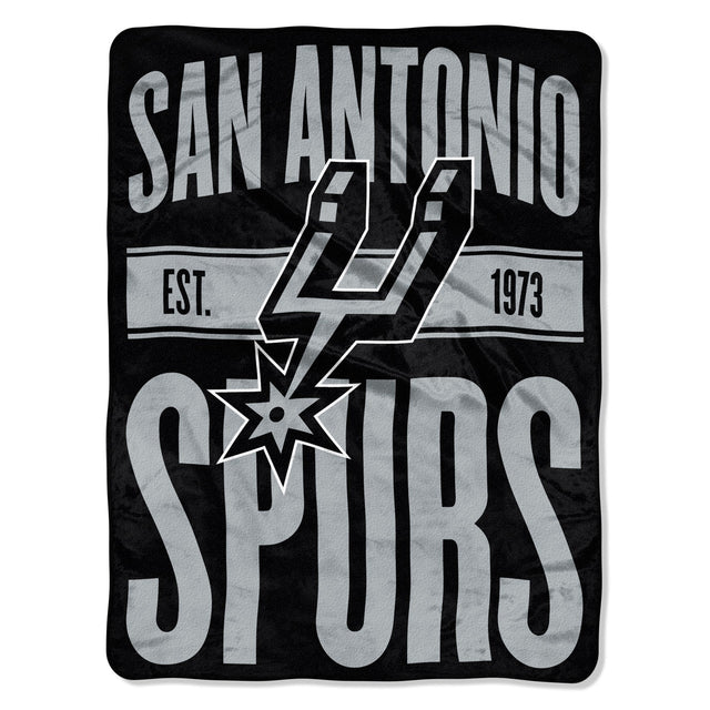 Manta de los San Antonio Spurs de 46 x 60 pulgadas, diseño micro Raschel transparente, enrollada