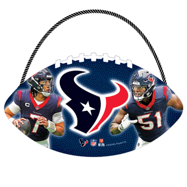 Fútbol de los Houston Texans colgando de madera