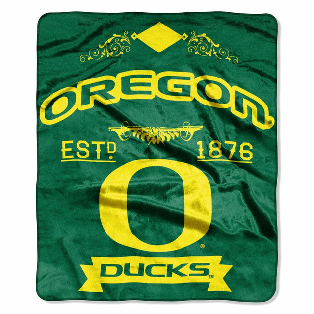 Manta de los Oregon Ducks de 50 x 60 con diseño de etiqueta Raschel