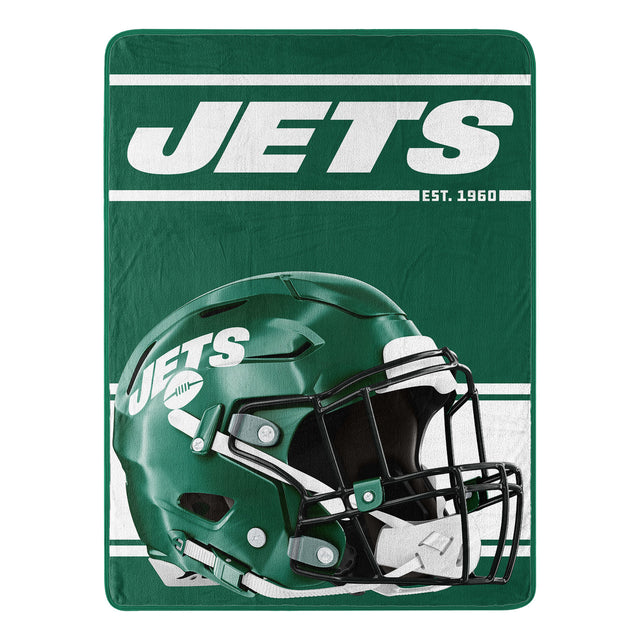 Manta de los New York Jets de 46 x 60 pulgadas con diseño Micro Raschel Run enrollada