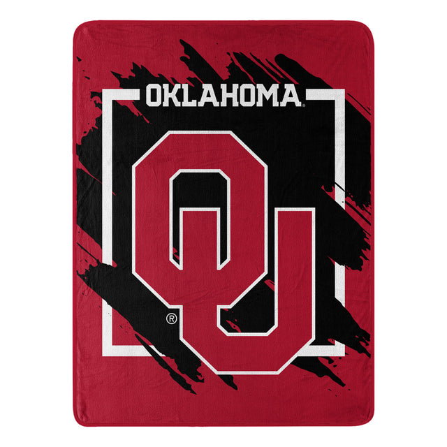 Manta Oklahoma Sooners 46x60 Micro Raschel Diseño dimensional Enrollado