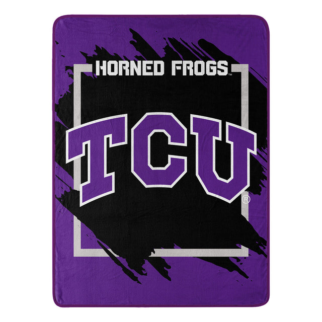 Manta TCU Horned Frogs de 46 x 60, diseño dimensional Micro Raschel, enrollada