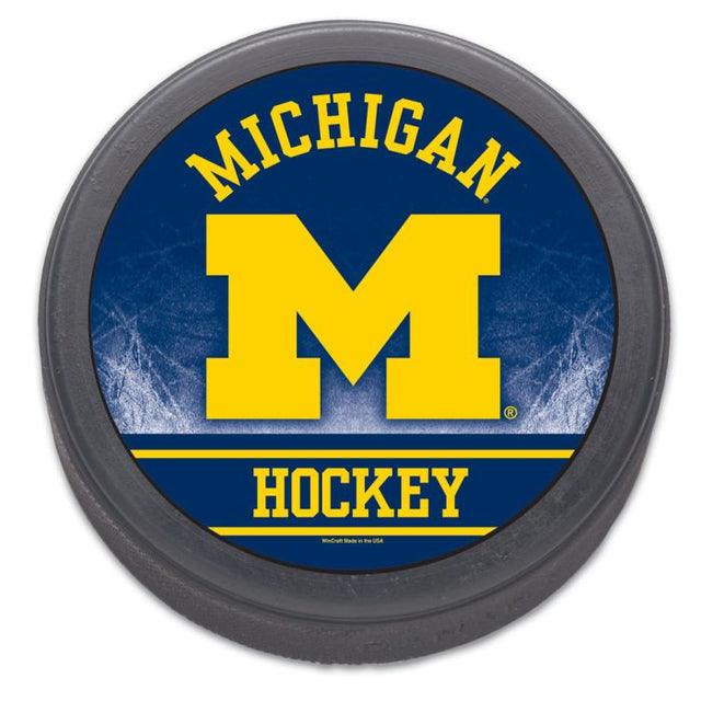 Disco de hockey de los Wolverines de Michigan