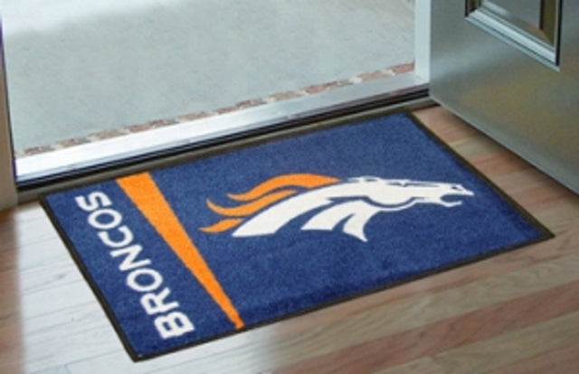 Alfombra de los Denver Broncos: estilo inicial, diseño de logotipo