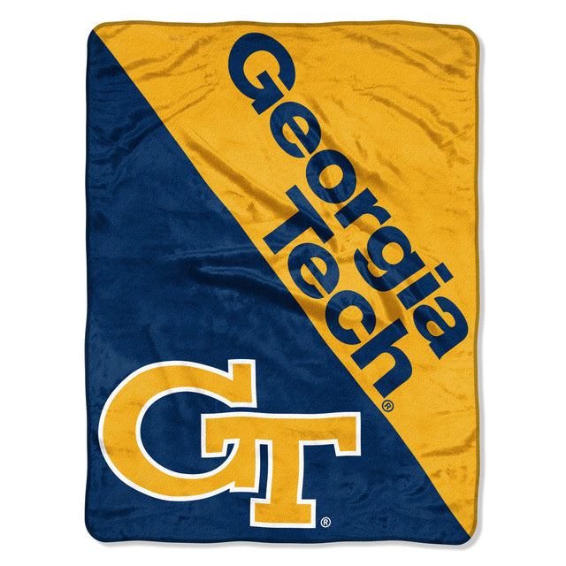 Manta de los Georgia Tech Yellow Jackets de 46 x 60 con diseño de microraschel en semitono enrollada