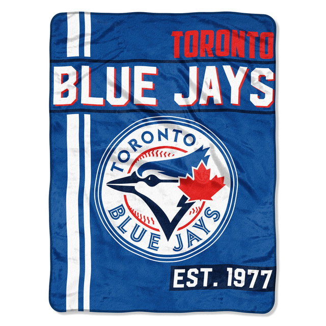 Manta de los Toronto Blue Jays de 46 x 60 pulgadas con diseño Micro Raschel Walk Off enrollada