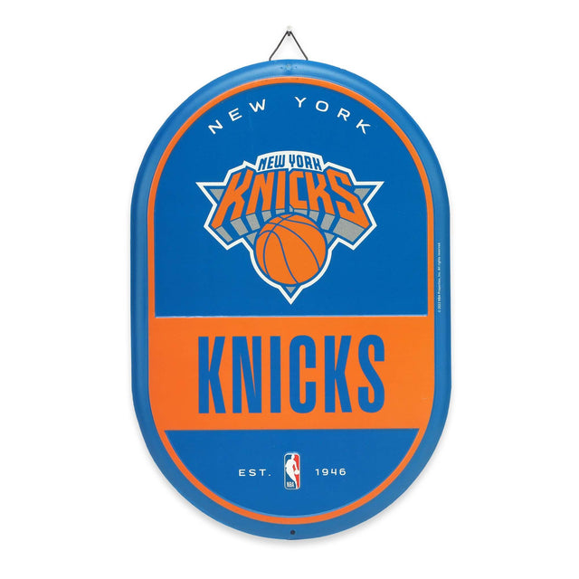 Letrero metálico ovalado con el espíritu de equipo de los New York Knicks