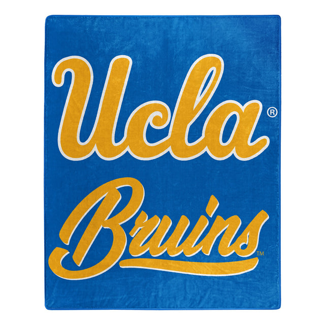 Manta de los Bruins de UCLA de 50 x 60 con diseño exclusivo de Raschel