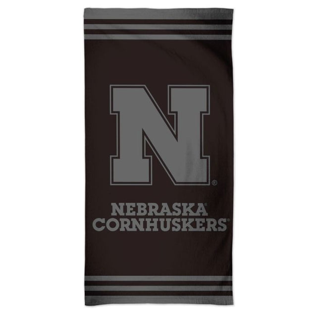 Toalla de playa Spectra de Nebraska Cornhuskers, color negro, 30" x 60"