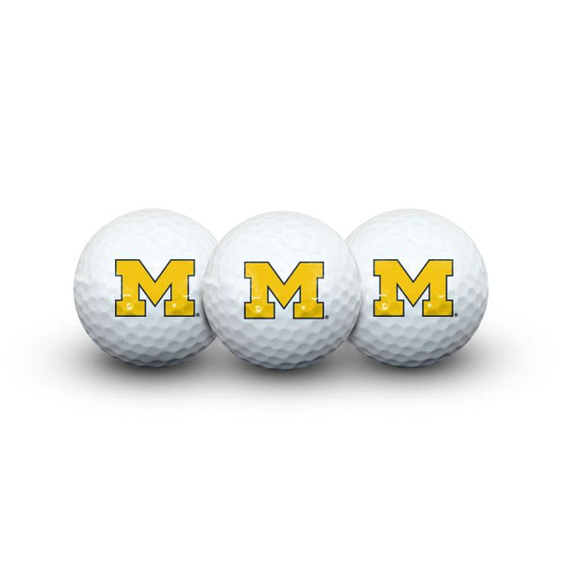 3 pelotas de golf de los Michigan Wolverines en estuche tipo concha