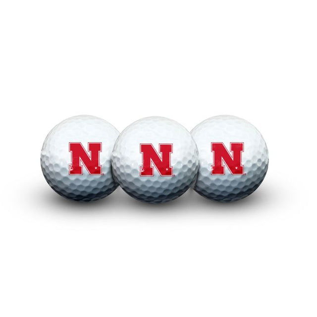 3 pelotas de golf de los Nebraska Cornhuskers en estuche tipo concha